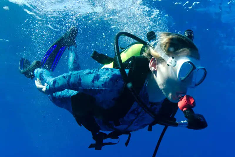 Diver underwater wearing an EasyDive Mini-SCUBA kit.