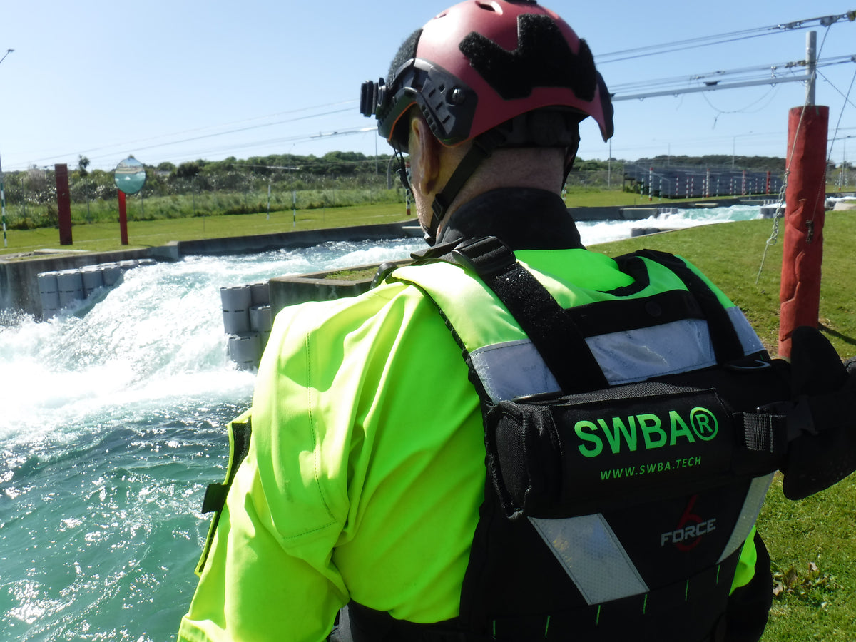 Holster mounted on back of PFD